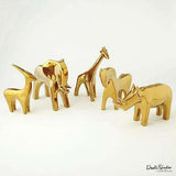 Rhino-Bright Gold scupture(قطعة  بشكل وحيد القرن-  لونها ذهبي لامع)